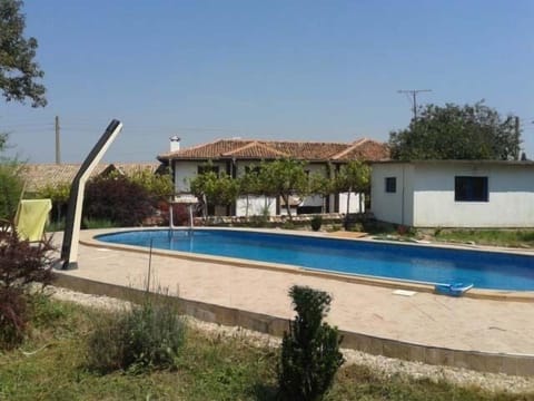 View of pool and main house