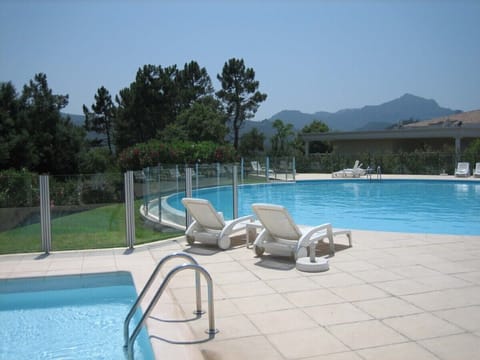 The large infinity pool has ample sun loungers ; beautiful views; W.C and shower
