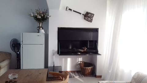 Enclosed barbeque room downstairs.