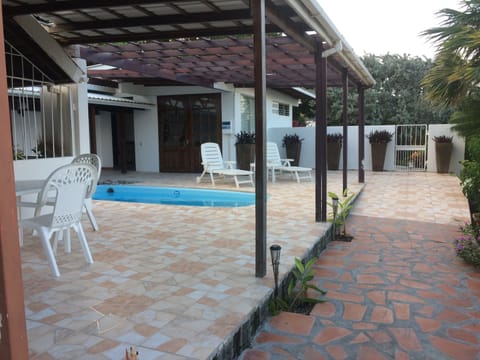 Terrace outside living room and pool area