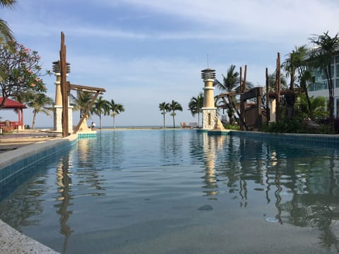 Nice swimming pool next from the beach