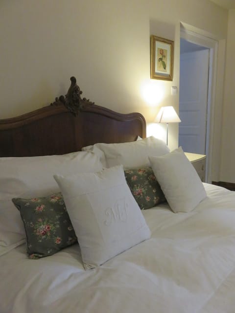 Antique French Bed with white Egyptian Cotton bedlinen.