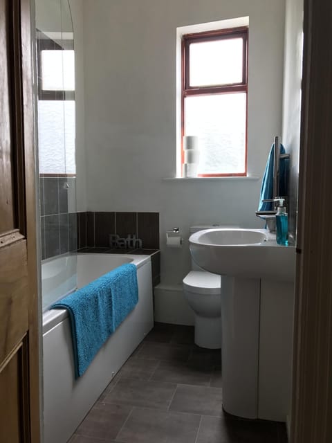 Shared Bathroom with Bath and Shower