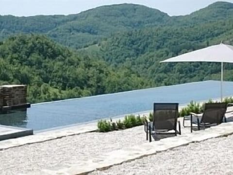Infinity Pool overlooking the Umbrian hills