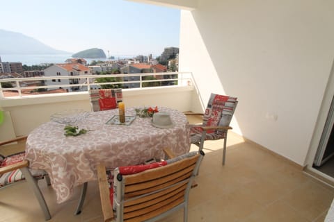 Balcony with table and chairs