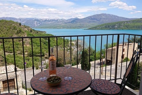 Balcony with stunning views of the lake and hills beyond