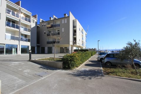 View to the Parking space and the entrance to the building