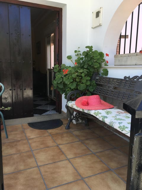 Front door and porch bench