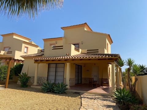 Villa front with patio area