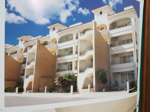 View of the apartment viewed from the ample car parking space car park 
