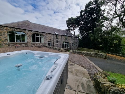 Dignity outside with hot tub.