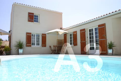 Entrance to apartment, far left of photo, and pool