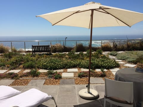 Sea view patio with loungers and barbecue