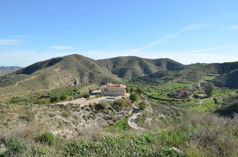 View from one of the peaks that surround the Villa