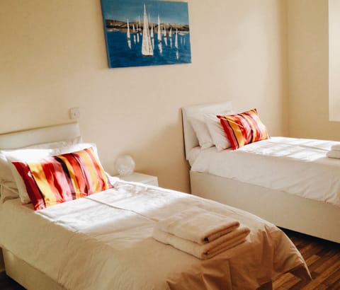 Master bedroom with either king or twin beds. This room has an ensuite bathroom.