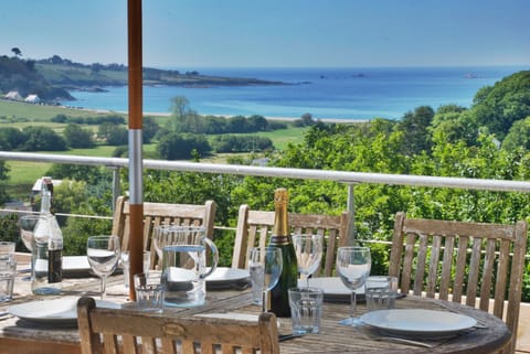 External dinning with sea and valley view