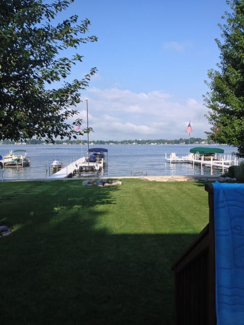 The view from the deck. The private pier for your pleasure. Sandy lake bottom
