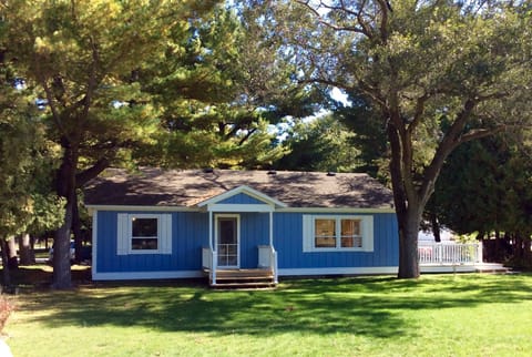 West side of cottage, nice grass for kids or a game of baggo!