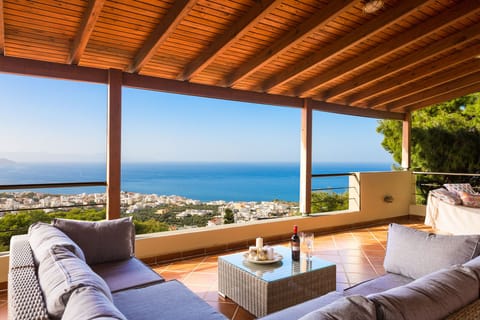 Veranda with a big sofa on the first floor, enjoy sea views of Chania City
