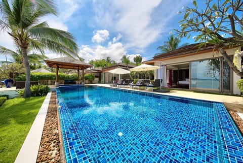 This villa features a 12m infinity pool with outdoor lounge area.