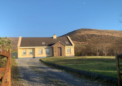 House photo under the moon