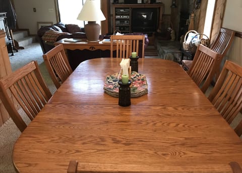 Oak dining table seats 6-8.