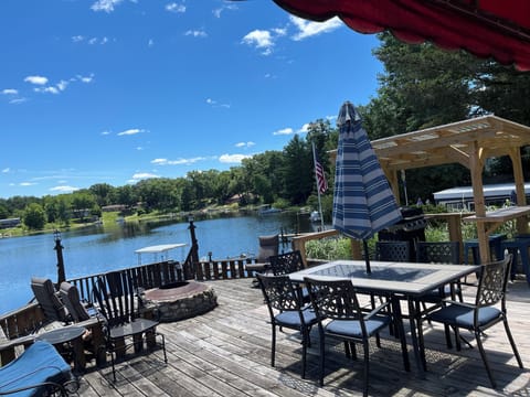 Sit outside have dinner while viewing the lake