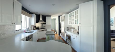 Fully-stocked kitchen with Subzero fridge, Viking stove top and double oven