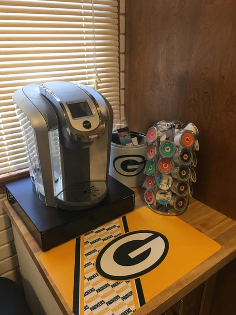 Kitchen: Keurig coffee maker at coffee bar 