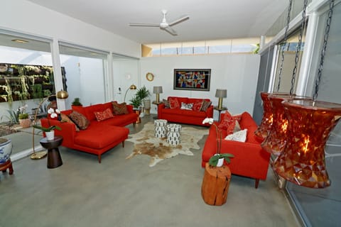 Relax in the living area with a 65 inch Samsung Frame TV