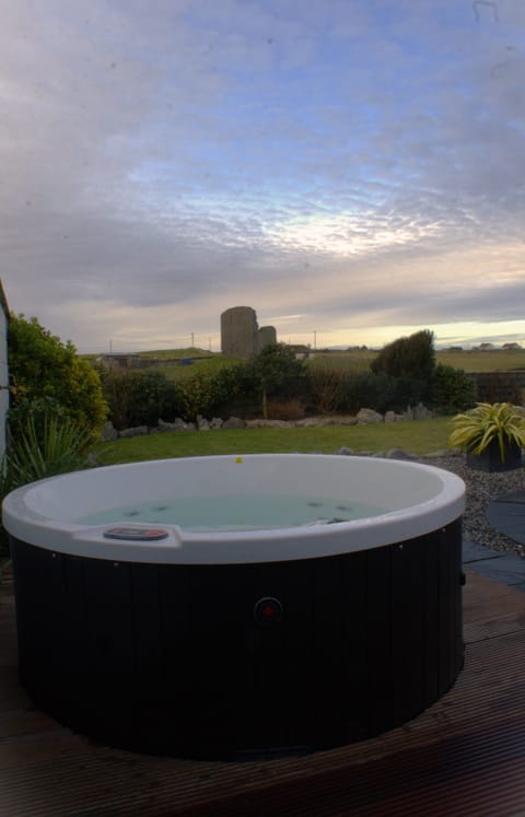 Private terrace with outdoor hot tub with view of 500 yr old castle
