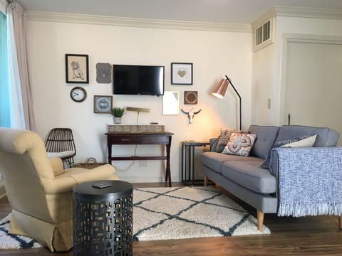 Living area. Desk has been upgraded. See addl. photos.