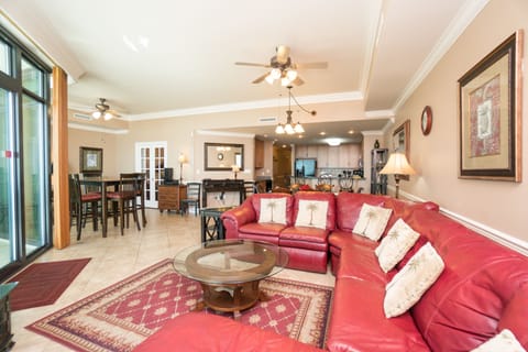 Living room with sectional sofa.  Game table for cards, checkers and chess.