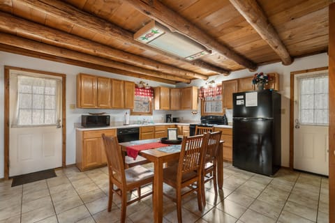 Large kitchen includes full size fridge, electric range, dishwasher & microwave