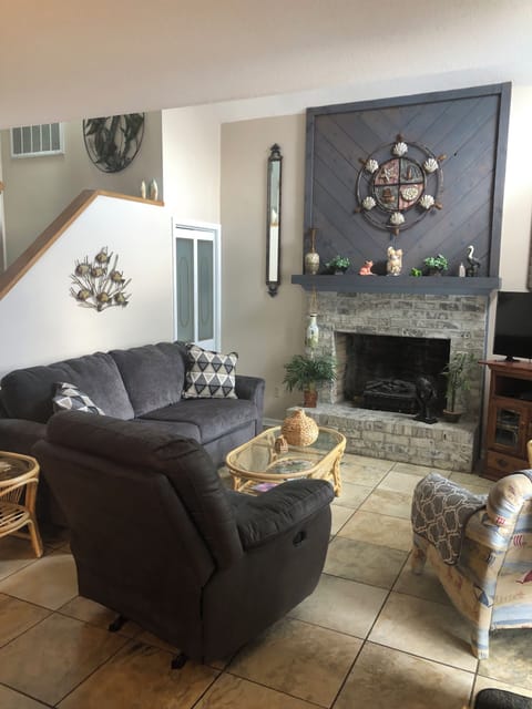 Living room with full size couch and recliner