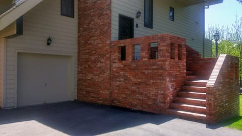 Single-car garage & front porch. Space enough for four vehicles!