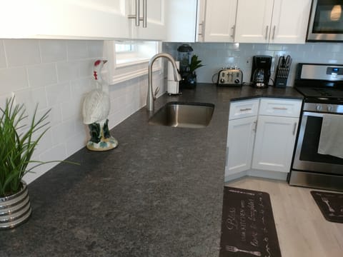 Granite Counters with Extra Wide and Deep Farm Sink!  High Spout Faucet!