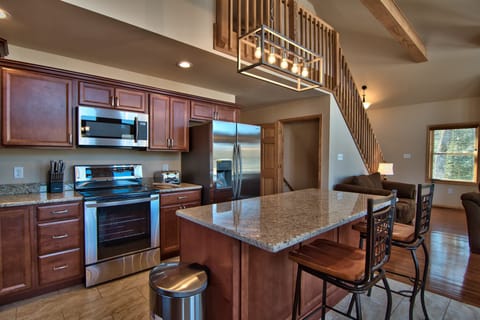 Eat-In Kitchen With Stainless Steel Appliances And Granite Countertops!