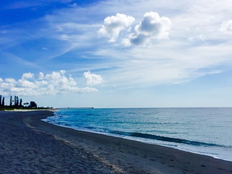 Your private beach one block walk from your location.