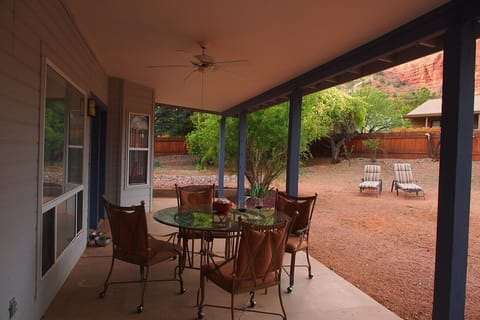Backyard covered patio with view of Castle Rock. he home has since been painted