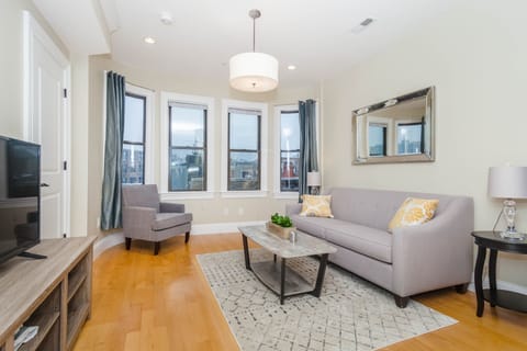 Light filled living room with view of Old North Church