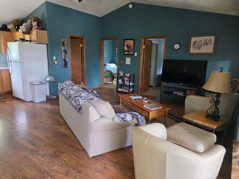 Living area with flat screen TV.