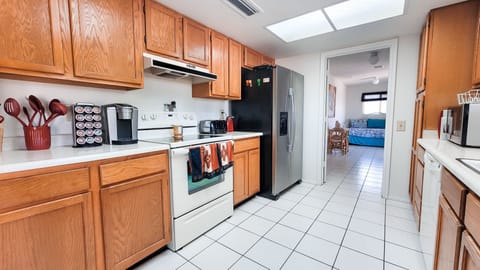 Lot of kitchen cupboard and countertop space. 