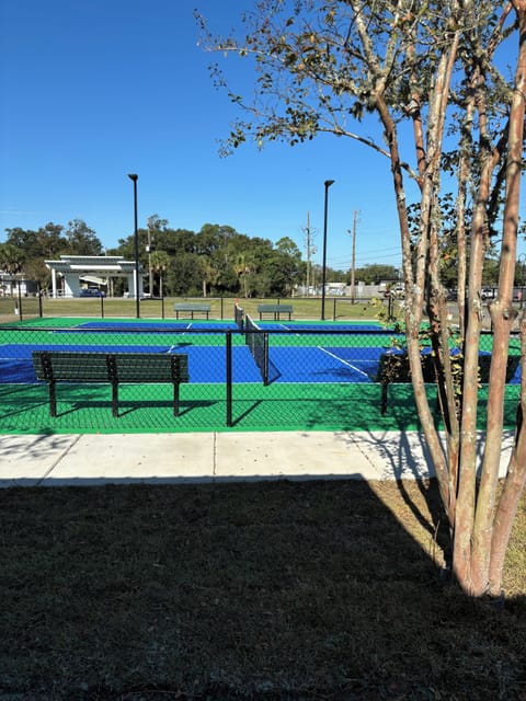 Pickleball is HERE!  Directly across the street.  Two lighted pickleball courts.