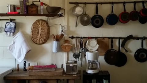 Kitchen area with utensils for cooking