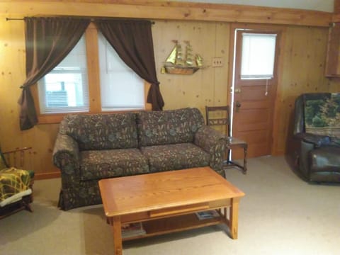 Living Room exposing Front Door and Porch