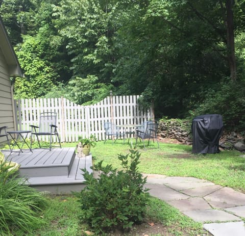 Deck with bbq grill in the yard