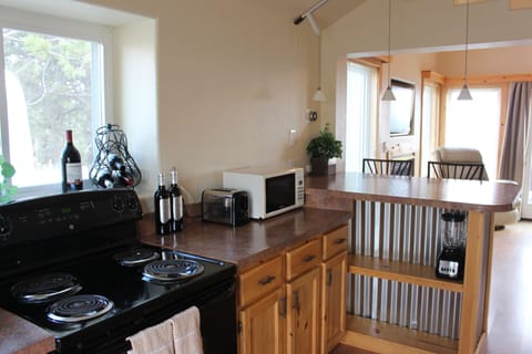 Bar for 2, Deck has table for 4, and we provide dining platters as well.