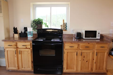 Knife block, plates, silverware, glasses, coffee mugs, mixer, don't see it ask!