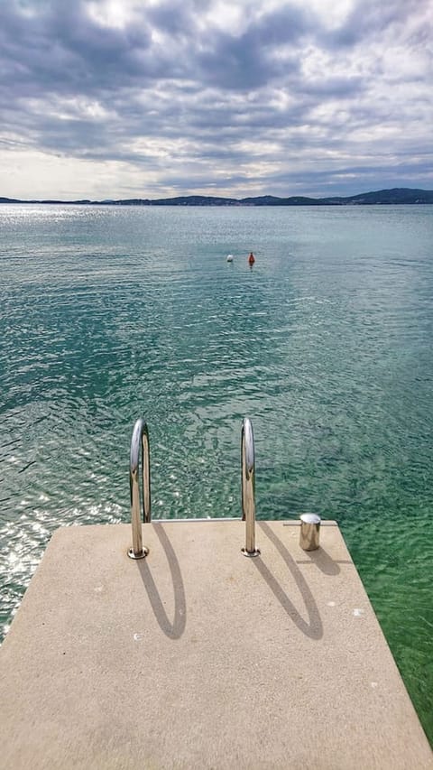 Bright, spacious beach villa with private sea access, jetty and garden House in Šibenik-Knin County, Croatia